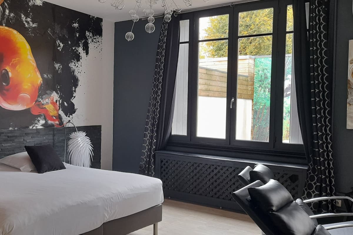 Suite, terras, uitzicht op tuin | 1 slaapkamer, luxe beddengoed, geluiddichte muren