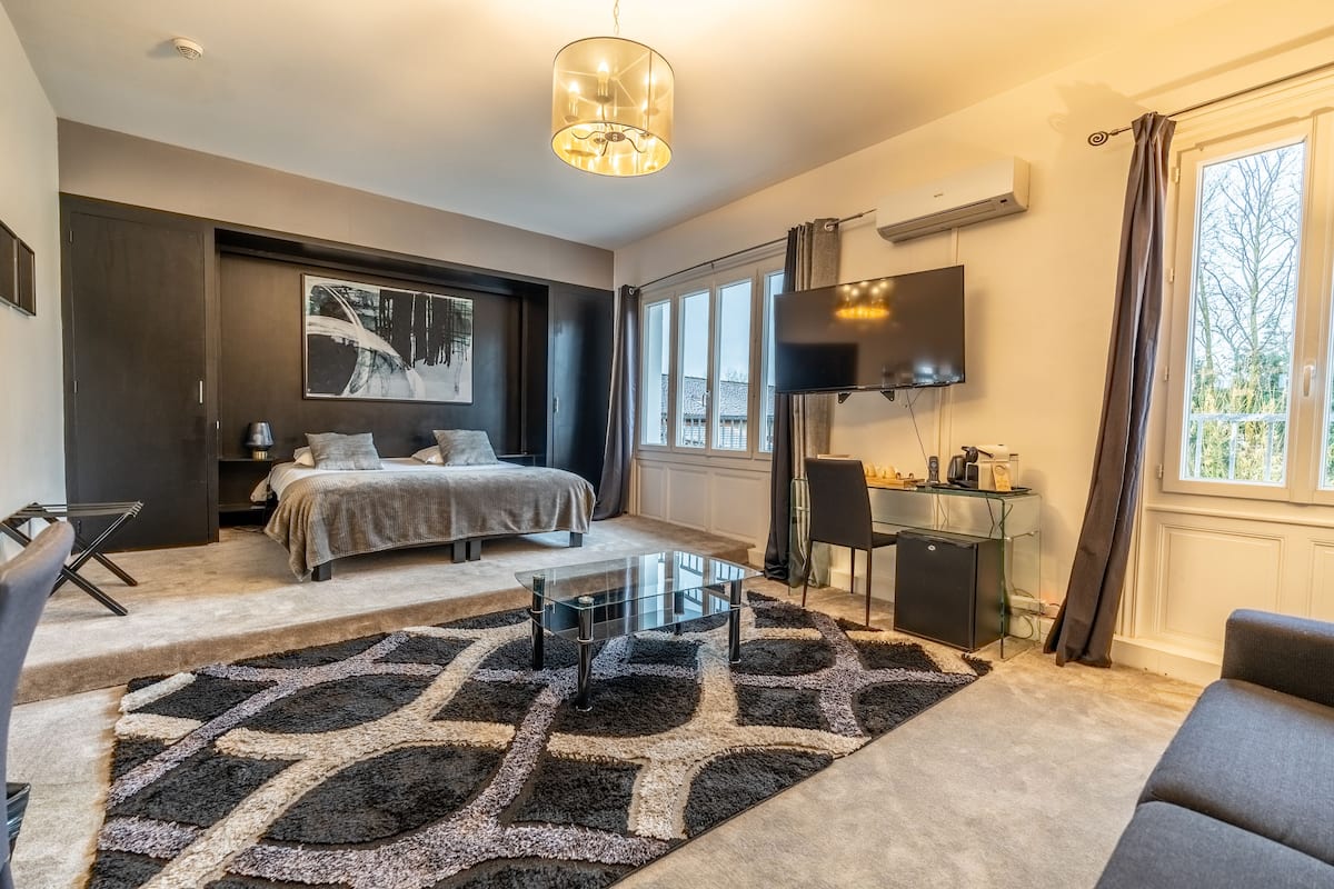 Suite, uitzicht op tuin | 1 slaapkamer, luxe beddengoed, geluiddichte muren