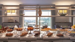 A buffet table with various baked goods and desserts. - Altarocca Wine Resort Adults Only (Orvieto)