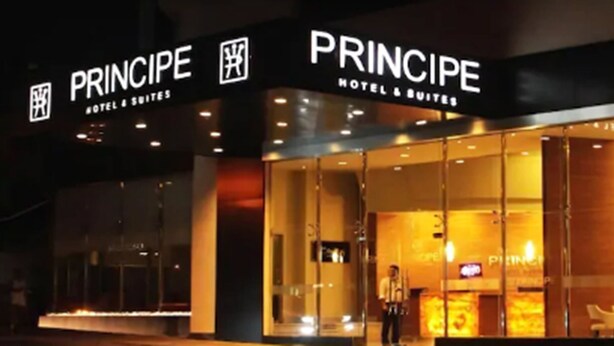 A hotel named PRINCIPE with a modern facade and large glass windows. - Principe Hotel and Suites (Panama City)