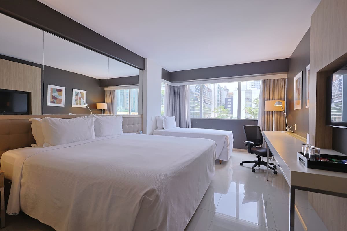 Family Room, Multiple Beds | Minibar, in-room safe, desk, laptop workspace