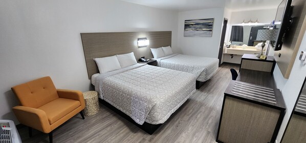 Habitación Deluxe, 2 camas de matrimonio, no fumadores, frigorífico y microondas | Colchones viscoelásticos y escritorio