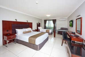 Executive Room, Multiple Beds, Non Smoking, Kitchen | In-room safe, desk, laptop workspace, soundproofing