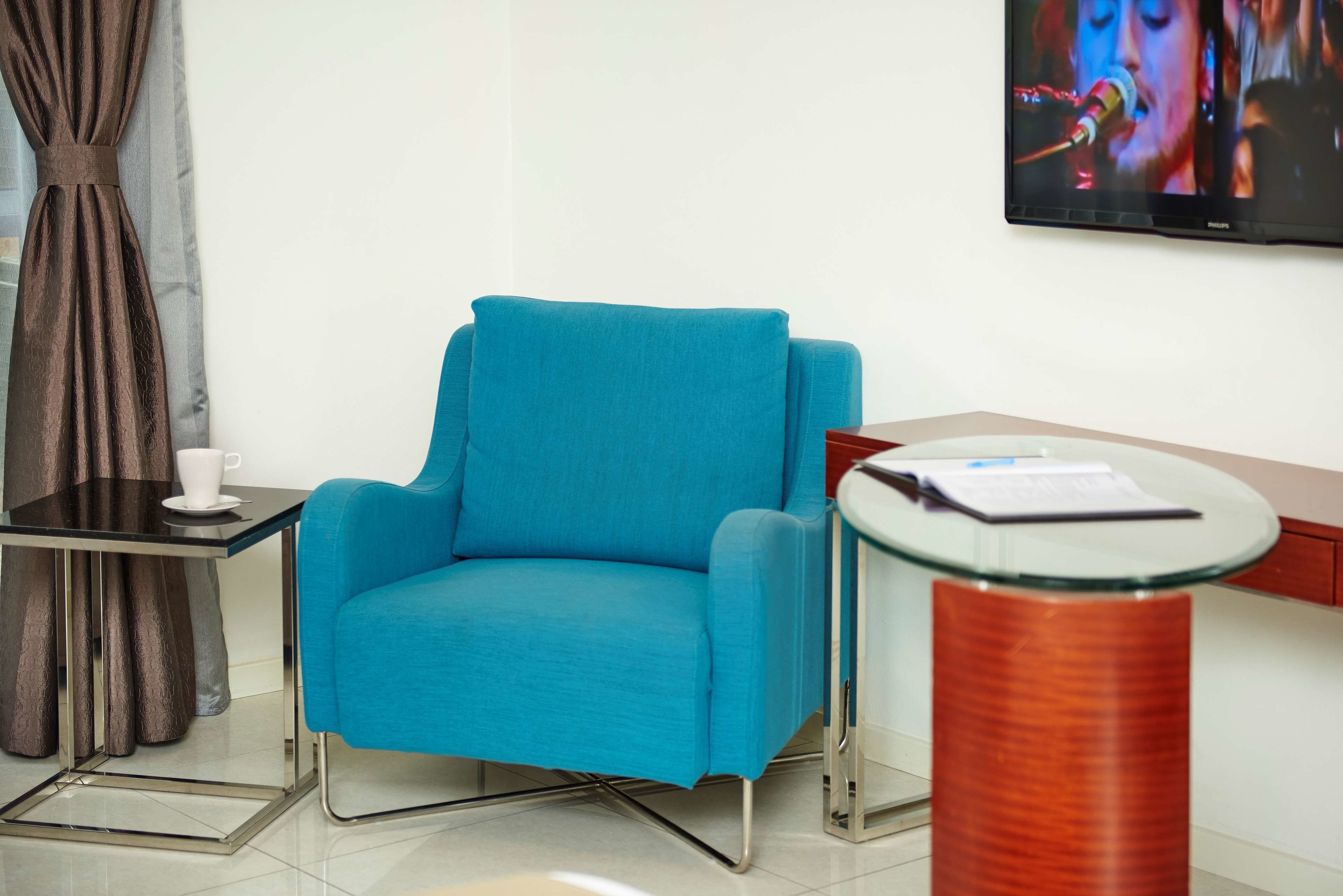 deluxe room, multiple beds, non smoking | in-room safe, desk, laptop workspace, soundproofing