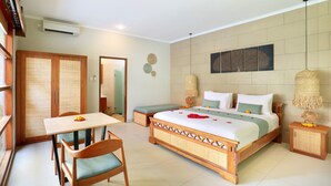 A bedroom with a bed, bedside tables, a desk with a chair, and a wardrobe. - The Vie Villa Legian (Seminyak)