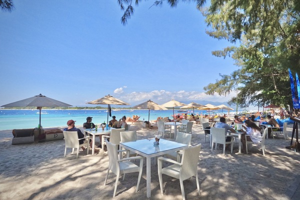 On the beach, sun loungers, beach umbrellas, scuba diving