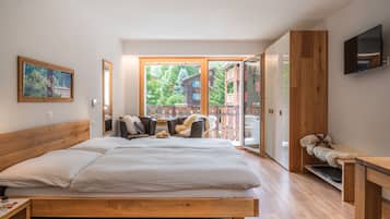 Premium bedding, down duvets, blackout curtains, soundproofing