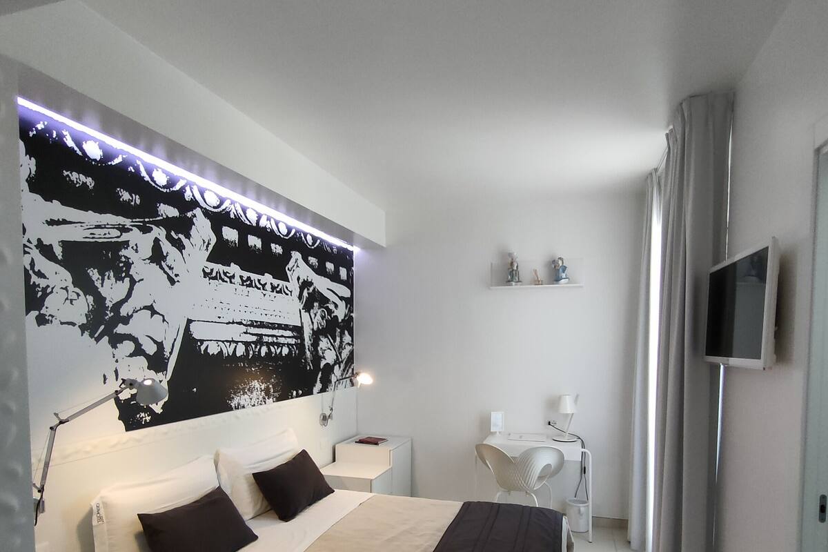 Double Room | Minibar, in-room safe, desk, blackout curtains