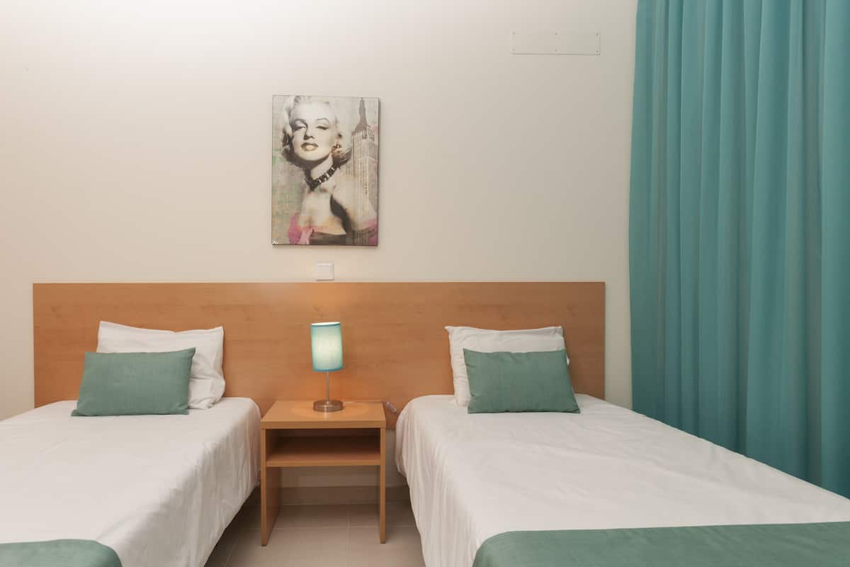 Blackout drapes, soundproofing, free WiFi, bed sheets