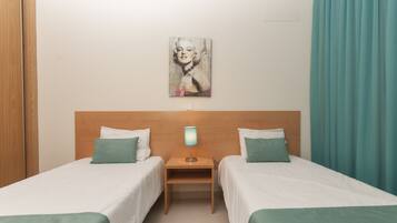 Blackout curtains, soundproofing, free WiFi, bed sheets