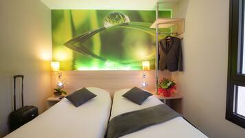 Twin Room | Premium bedding, desk, blackout drapes, soundproofing
