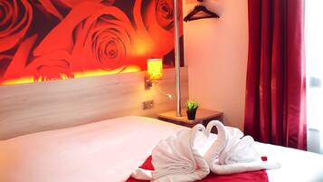 Premium bedding, desk, blackout drapes, soundproofing