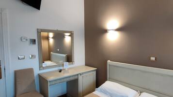 Double Room | Minibar, in-room safe, individually decorated, individually furnished
