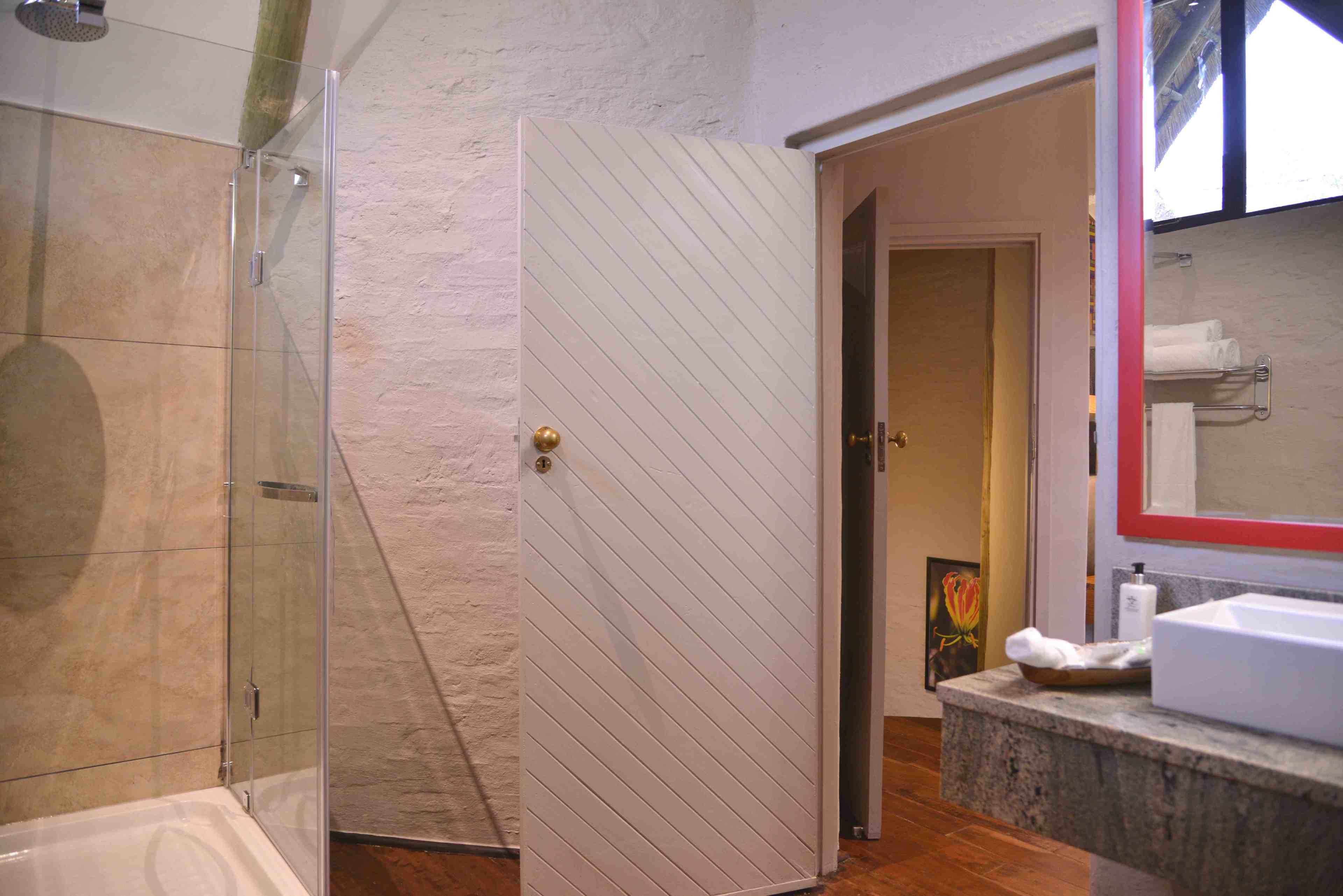 separate bathtub and shower, free toiletries, hair dryer, bathrobes