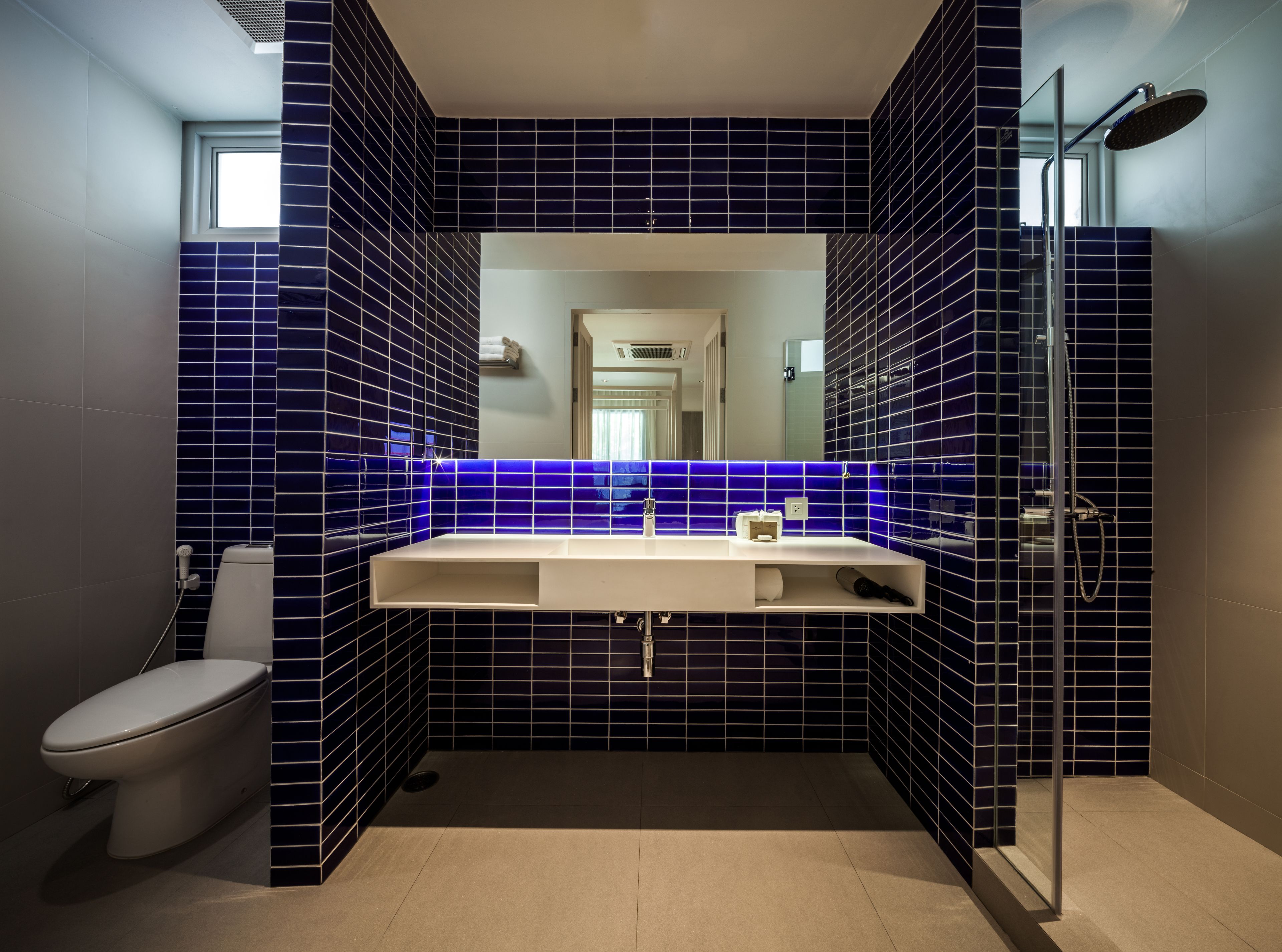 deluxe room  | bathroom | rainfall showerhead, free toiletries, hair dryer, bathrobes
