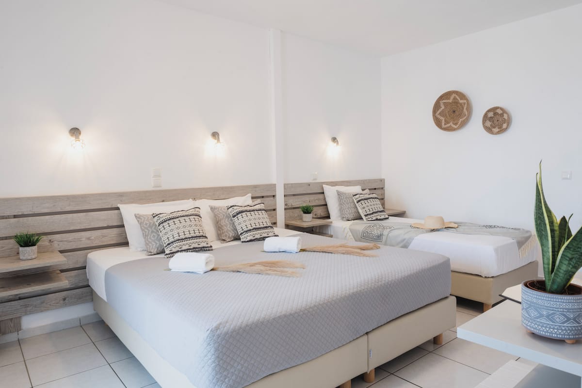 Deluxe Triple Room, Sea View | Premium bedding, memory-foam beds, individually decorated