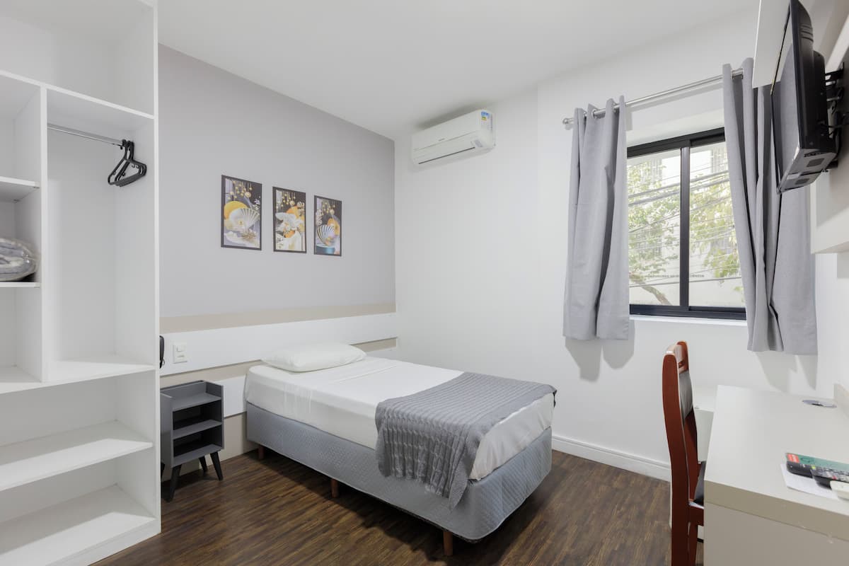 Habitación individual | Minibar, escritorio, cortinas blackout y wifi gratis