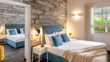 Family Room, 2 Bedrooms | Minibar, desk, soundproofing, iron/ironing board