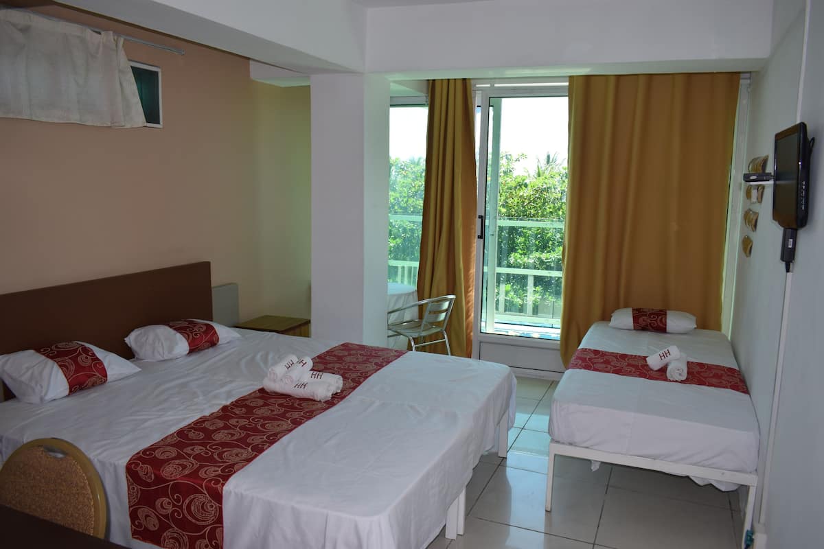Chambre Triple Standard | Minibar, coffres-forts dans les chambres, Wi-Fi gratuit, draps fournis