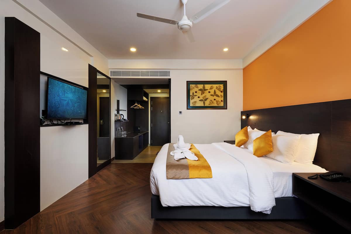 deluxe double room | premium bedding, in-room safe, desk, laptop workspace
