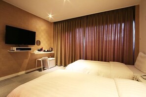 Camera Deluxe con 2 letti singoli | Biancheria da letto di alta qualità, copriletto in piuma
