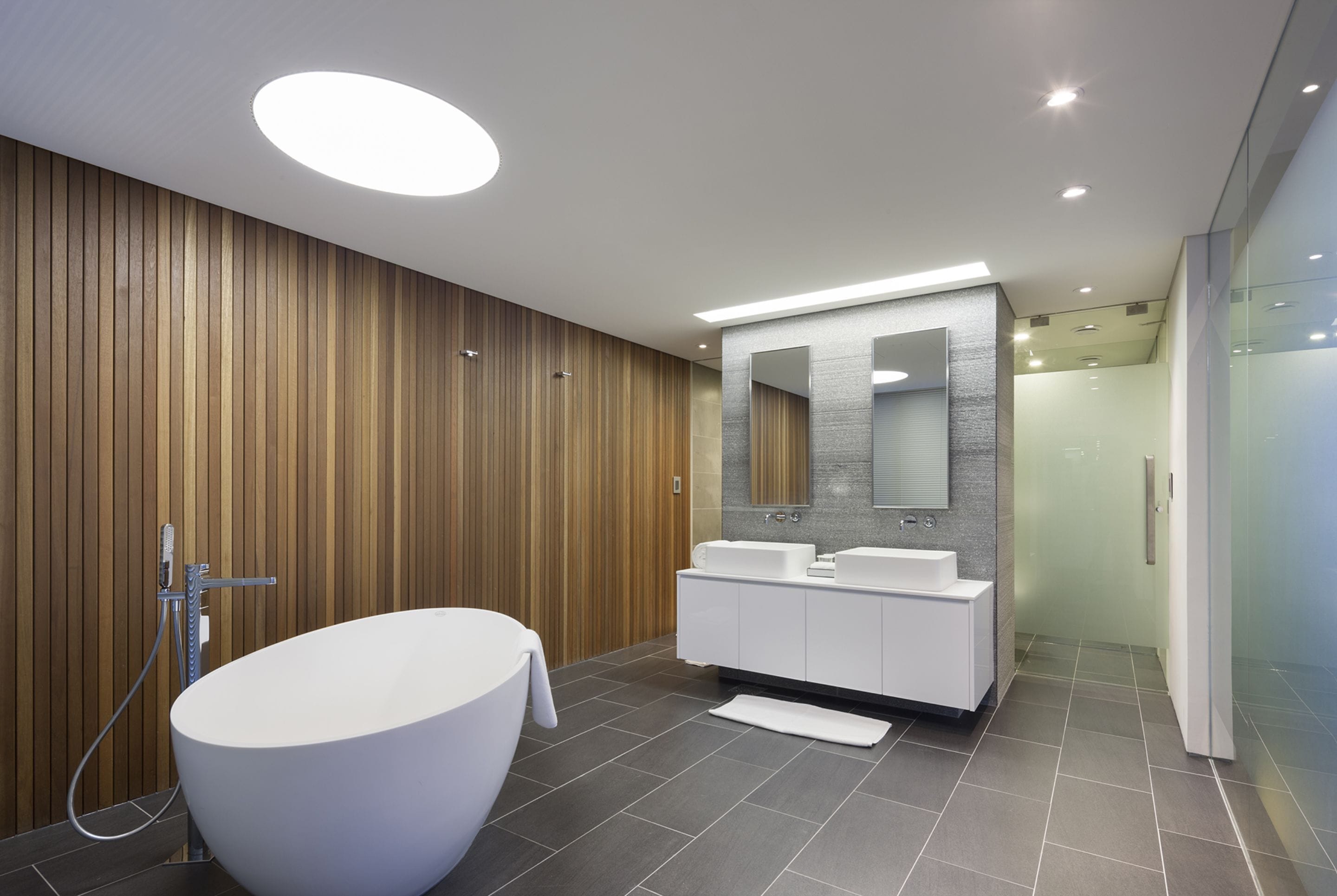 designer toiletries, hair dryer, bathrobes, slippers