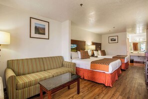 Premium bedding, down comforters, pillowtop beds, individually decorated - Sandia Peak Inn Old Town ABQ, a Howard Johnson by Wyndham (Albuquerque)