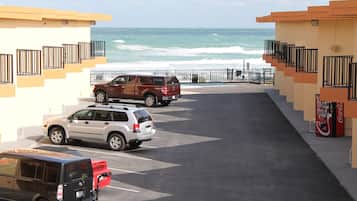 Guests can park their vehicles in the designated area with ocean views.