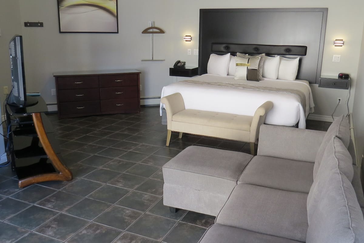 Suite, 1 King Bed | 1 bedroom, individually decorated, individually furnished