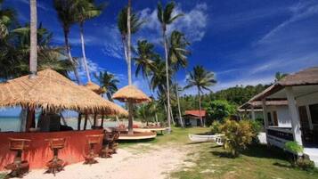 On the beach, beach umbrellas, beach bar, kayaking