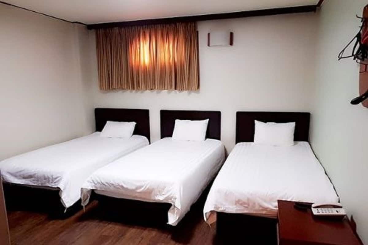 Standard Triple Room | Blackout drapes