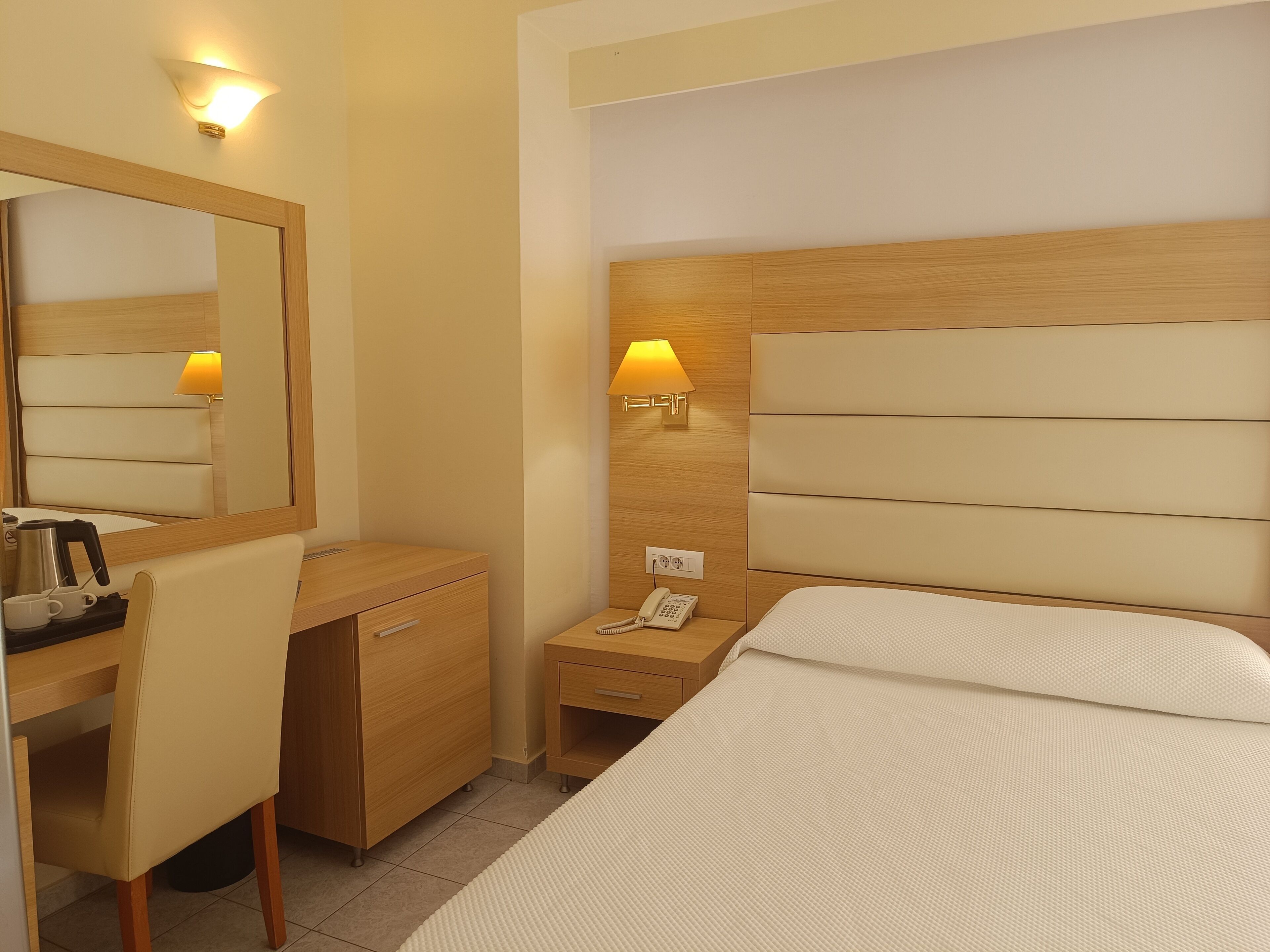 Desk, blackout curtains, free cots/infant beds, rollaway beds