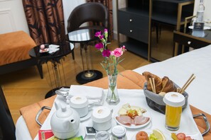 Suite, 1 King Bed | In-room dining