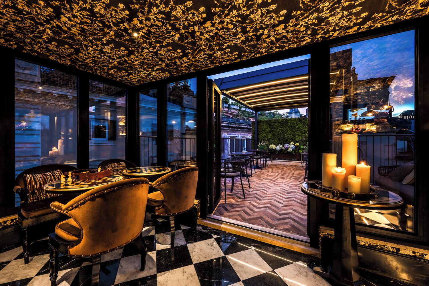A luxurious interior with a checkered floor, elegant furniture, and a view through large windows.