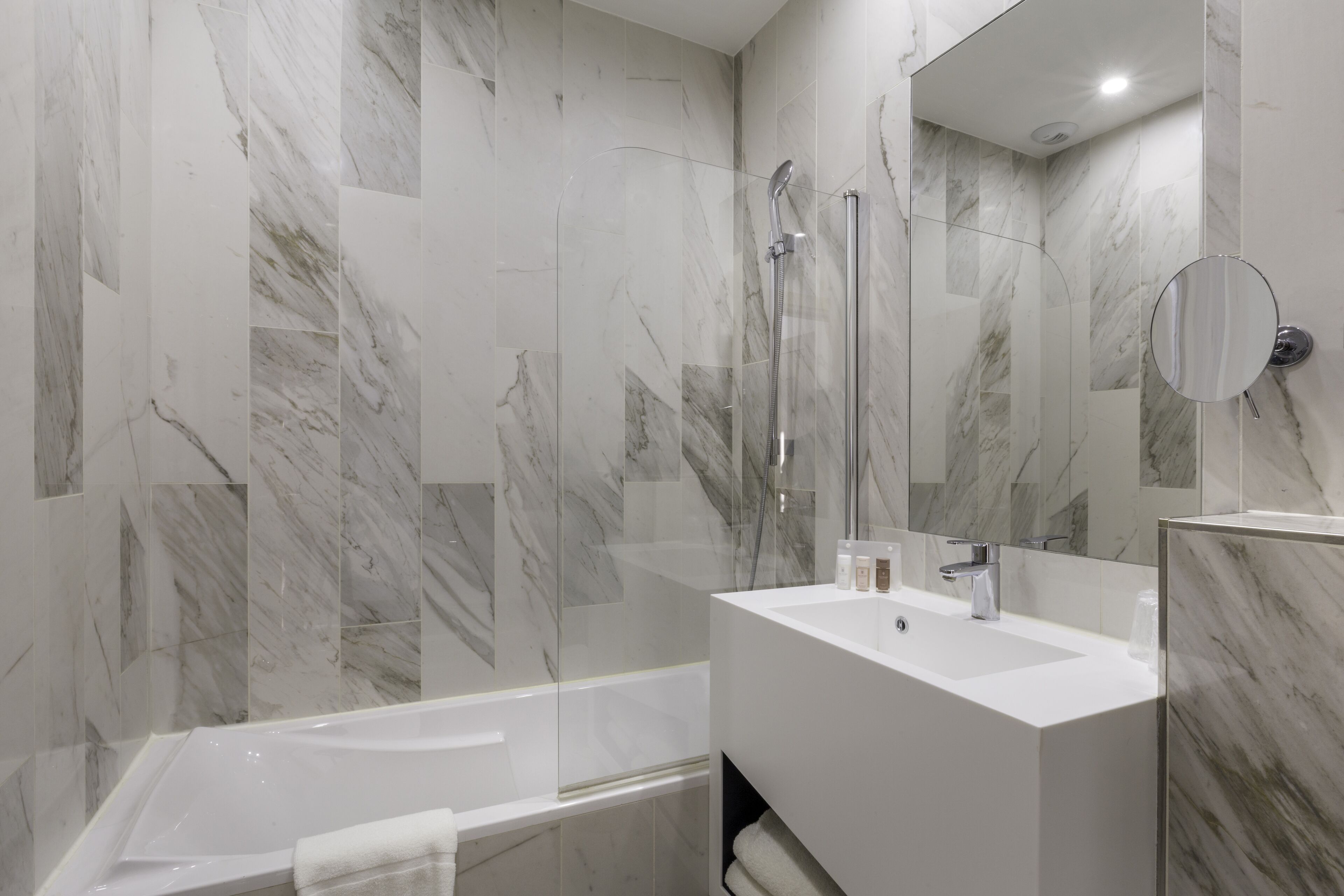 classic room, 1 queen bed, non smoking | bathroom | shower, eco-friendly toiletries, hair dryer, towels