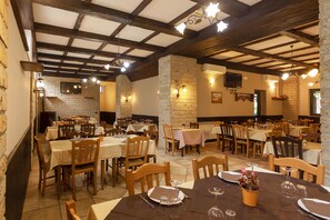 Breakfast, lunch, dinner served; local cuisine, al fresco dining