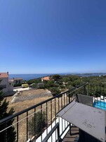 Comfort Room, Balcony, Pool View | Terrace/patio