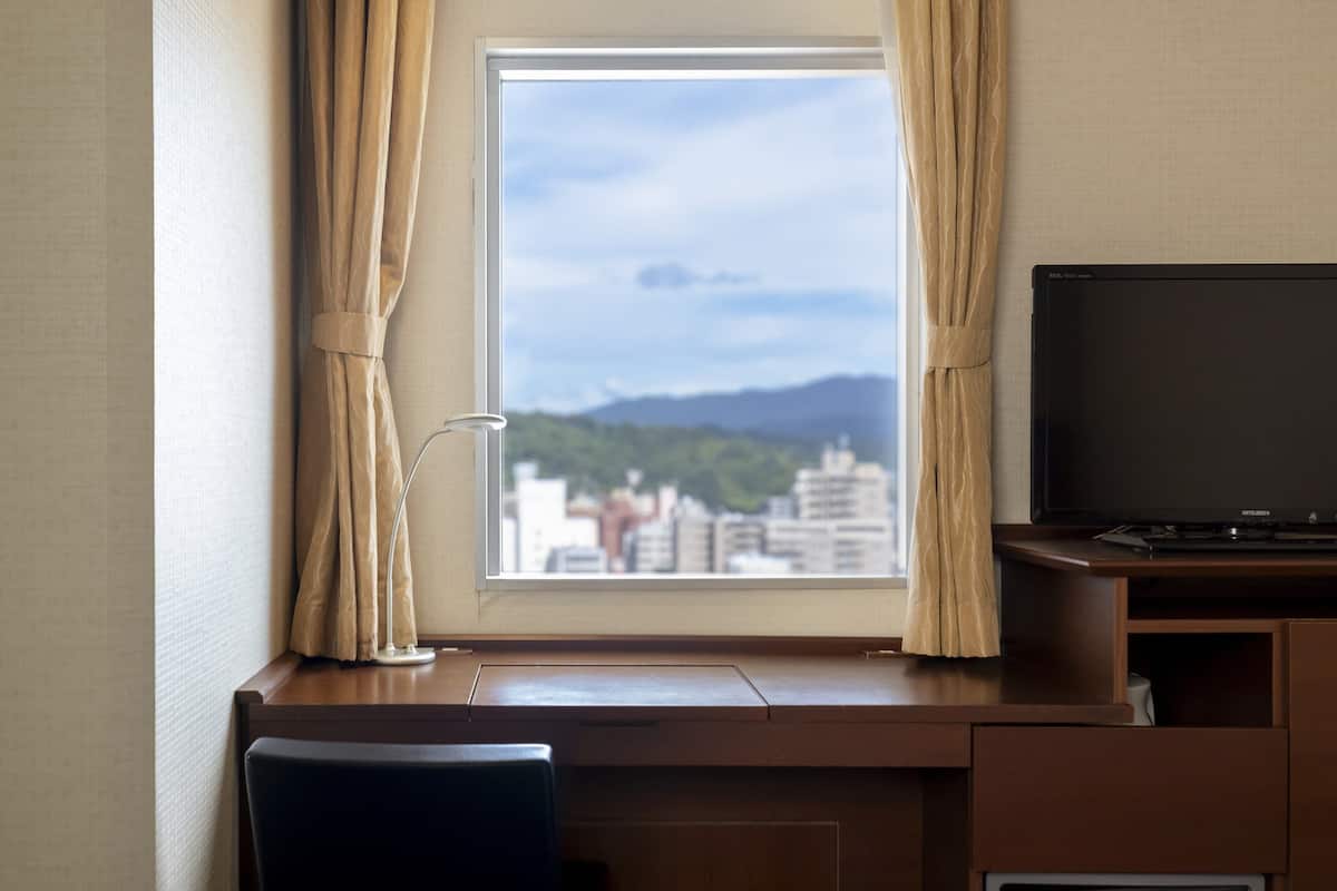 In-room safe, desk, blackout curtains, iron/ironing board