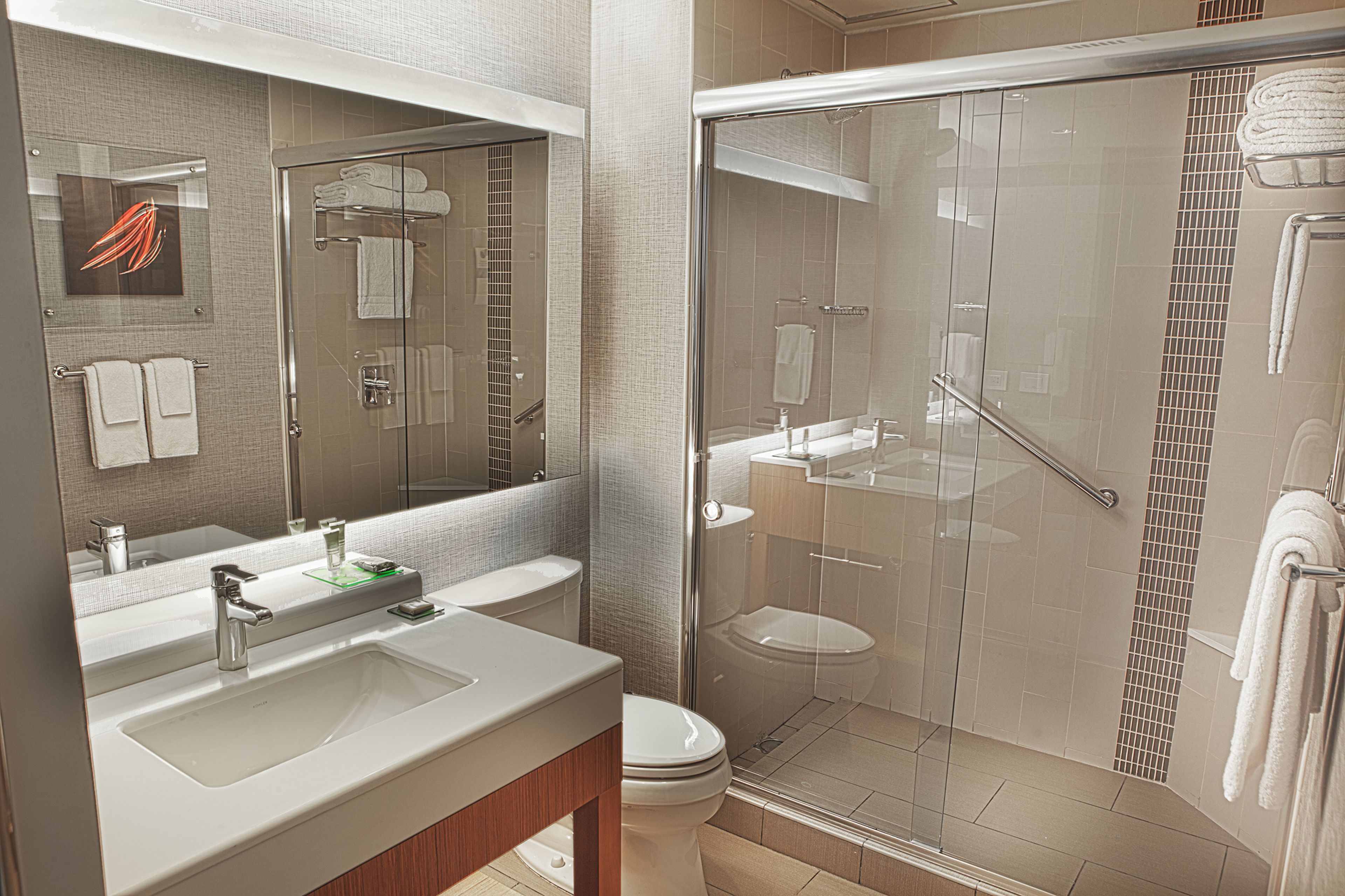 rainfall showerhead, designer toiletries, hair dryer, towels