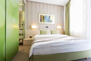 Superior Double Room | Minibar, in-room safe, desk, laptop workspace
