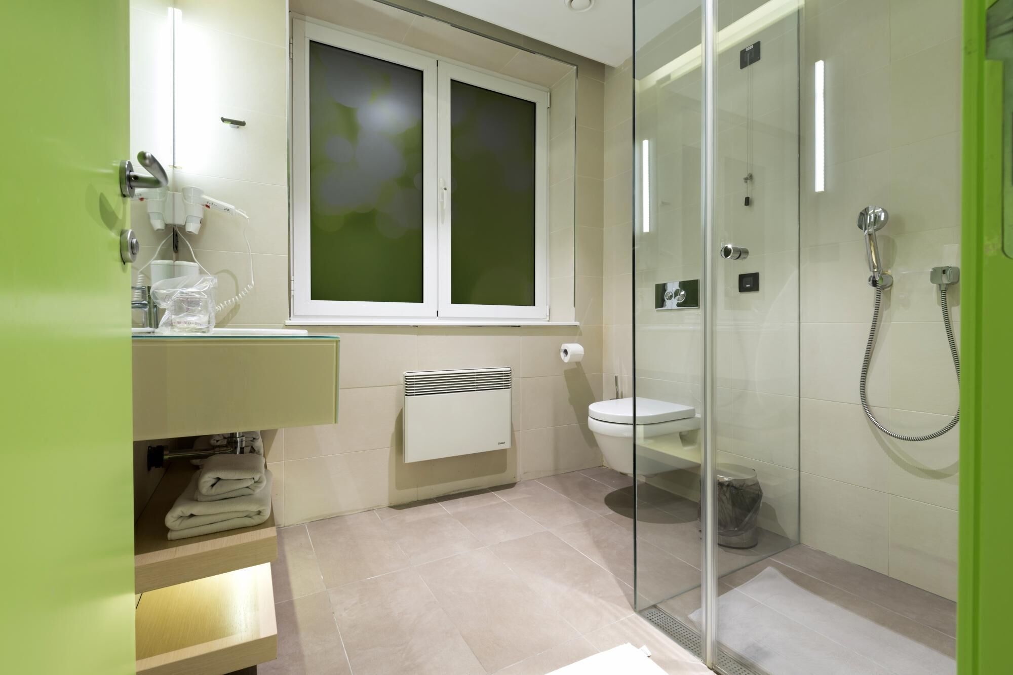 family room | bathroom | shower, rainfall showerhead, free toiletries, hair dryer