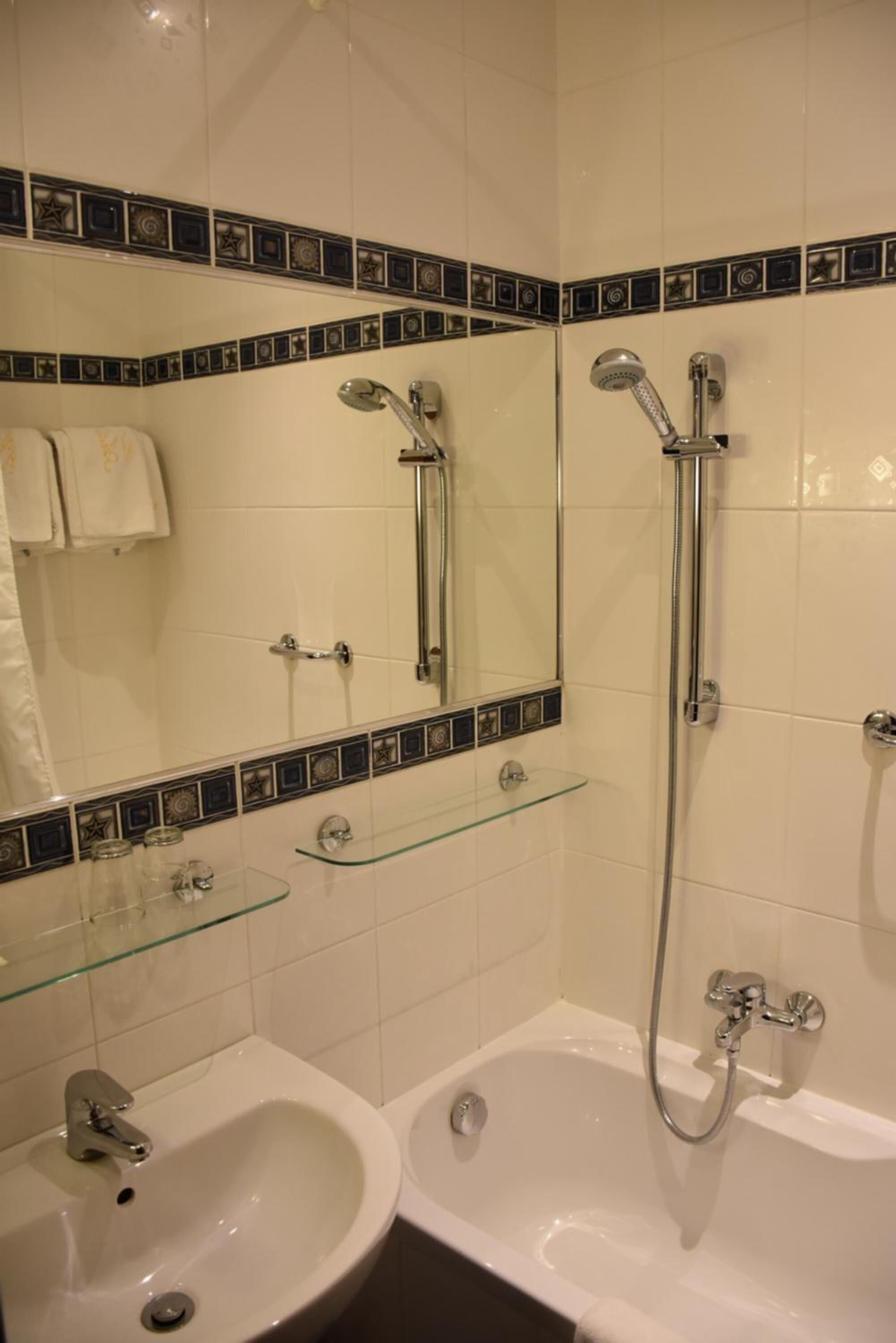 bathtub, free toiletries, hair dryer, towels
