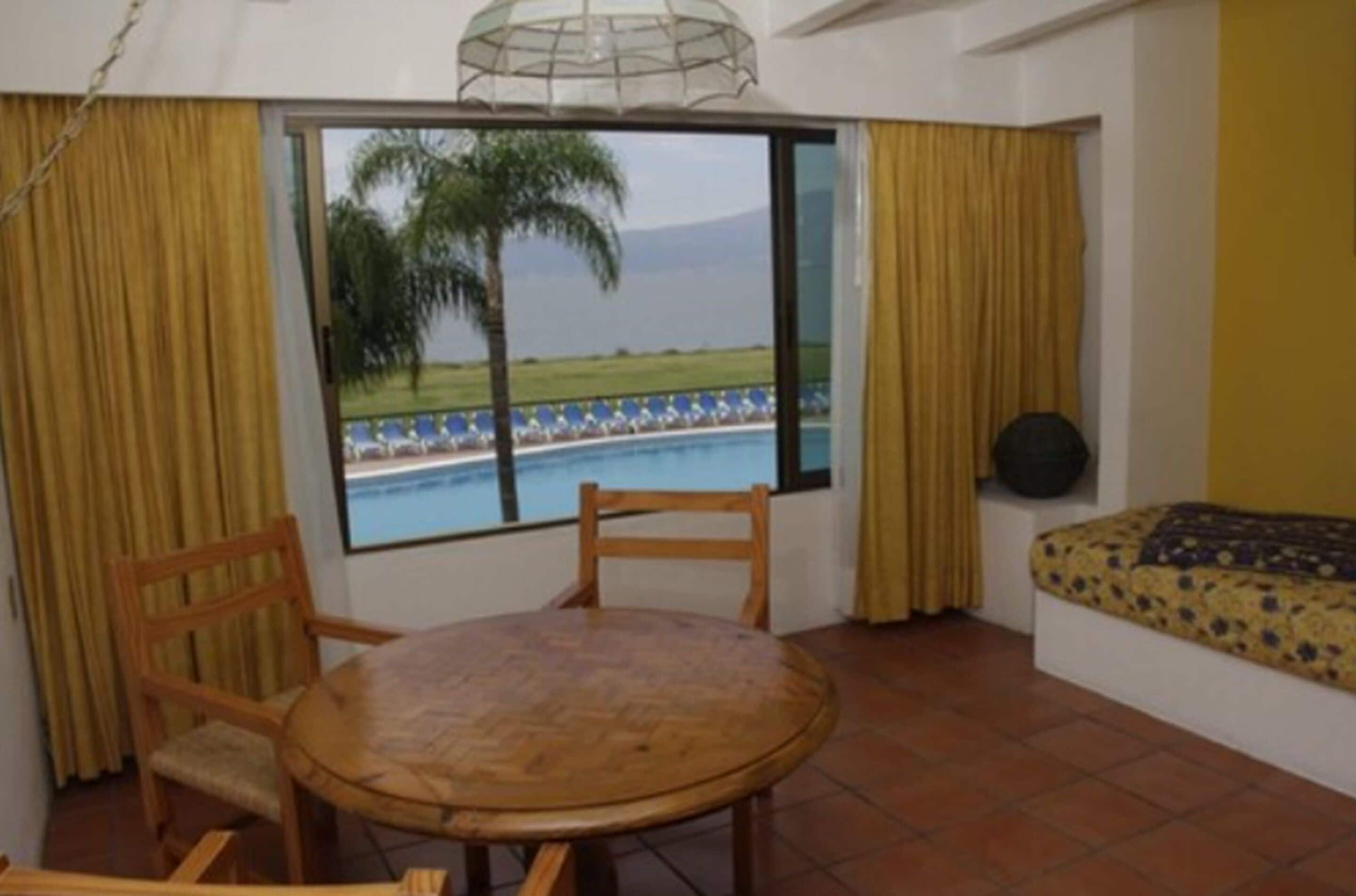 double room, 2 double beds, lake view | 1 bedroom, in-room safe, desk, laptop workspace