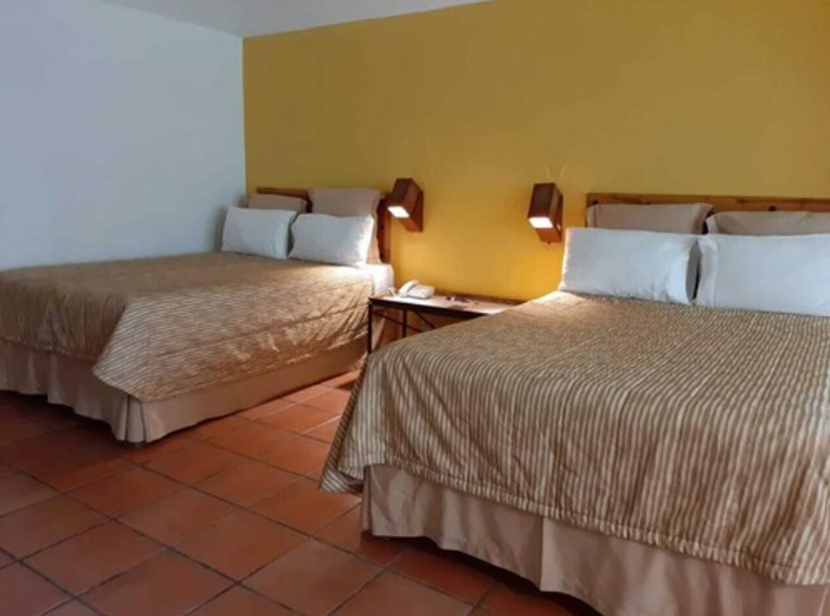 double room, 2 double beds, garden view | 1 bedroom, in-room safe, desk, laptop workspace