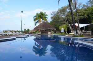 Seasonal outdoor pool, pool loungers