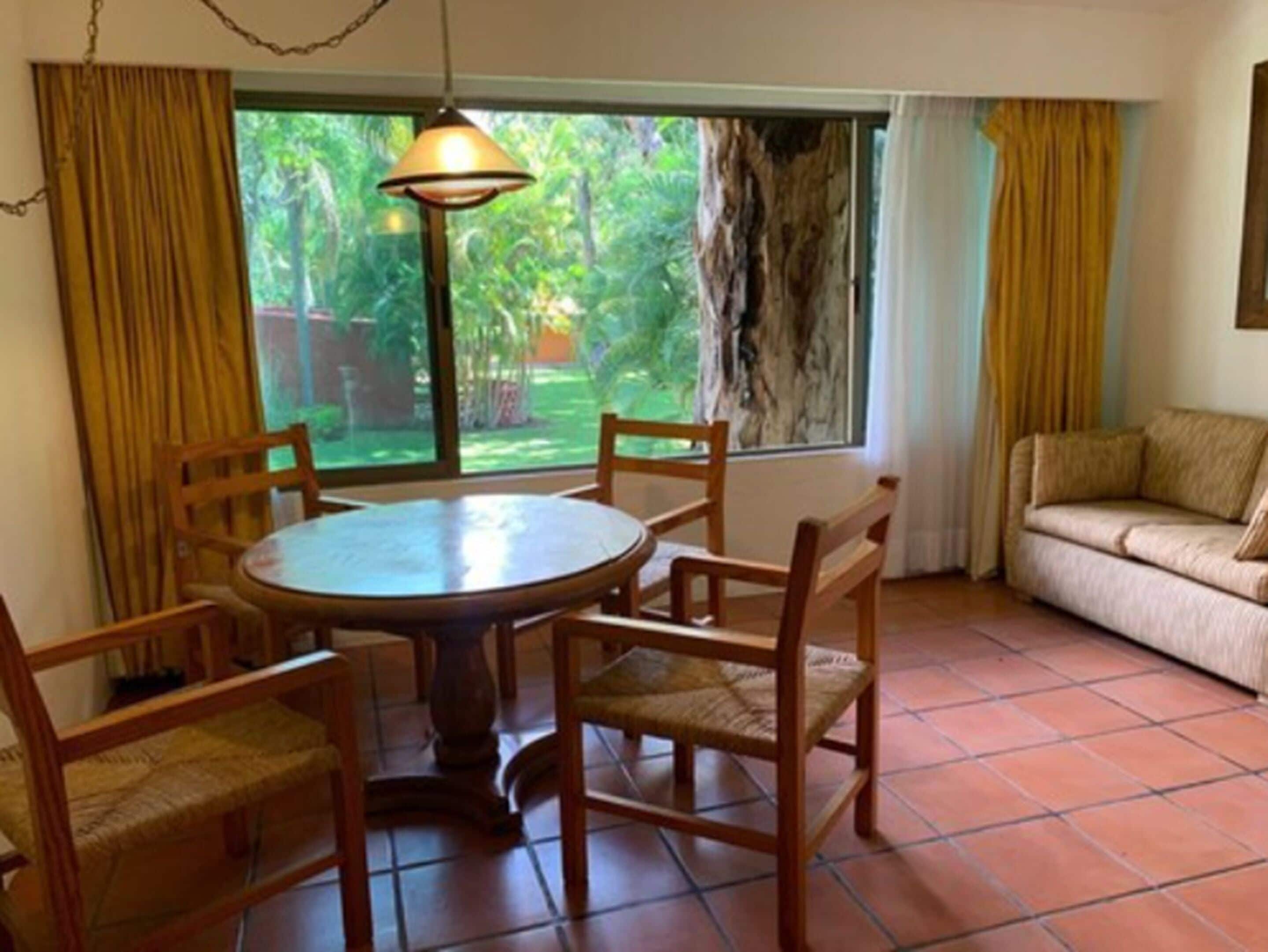 double room, 2 double beds, garden view | 1 bedroom, in-room safe, desk, laptop workspace