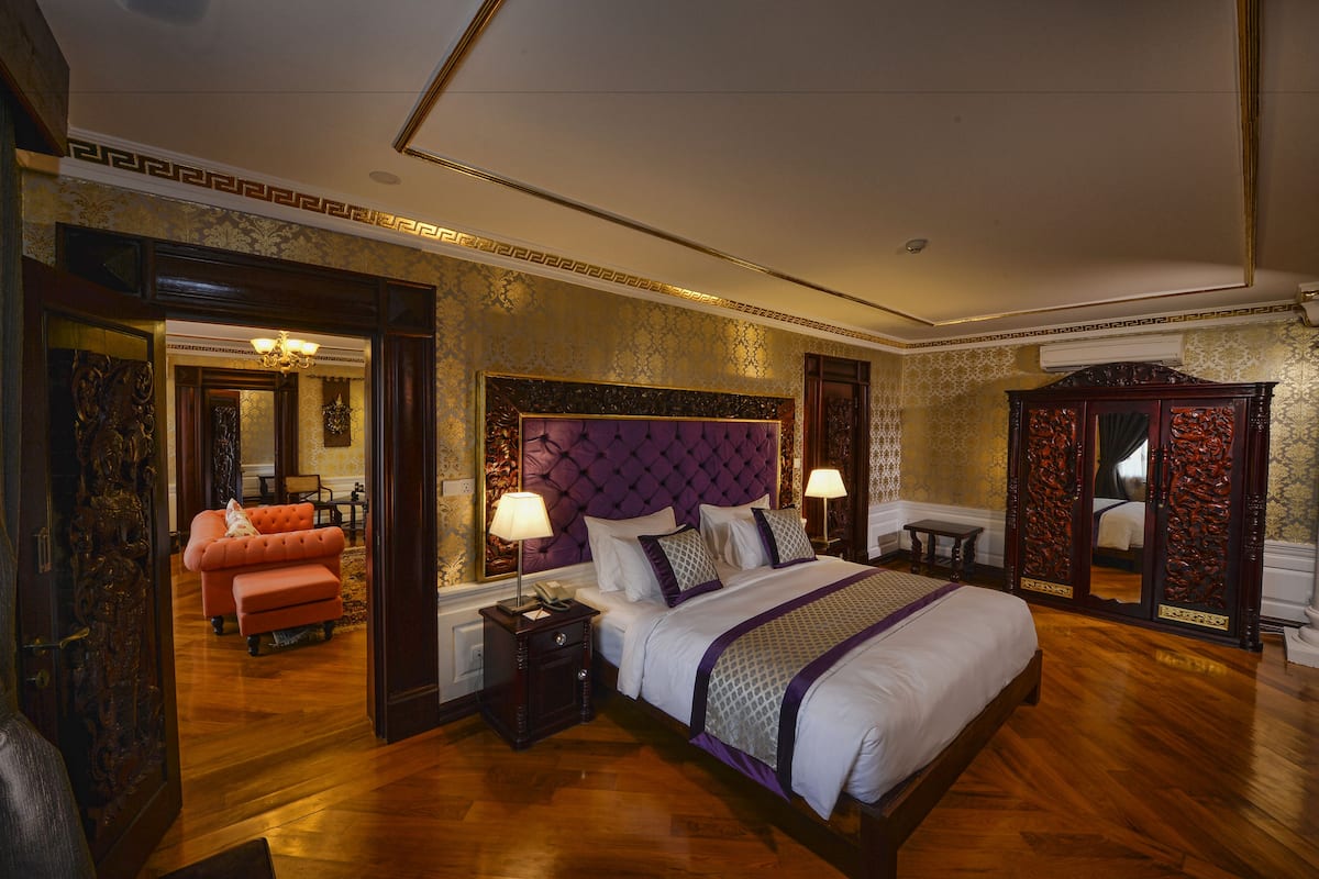 Suite, 2 Bedrooms | Down duvets, minibar, in-room safe, individually furnished