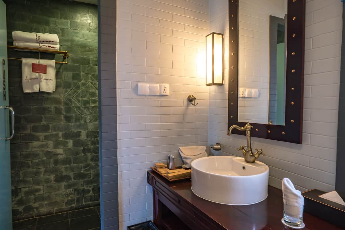 villa, 1 bedroom | bathroom | separate bathtub and shower, rainfall showerhead, designer toiletries