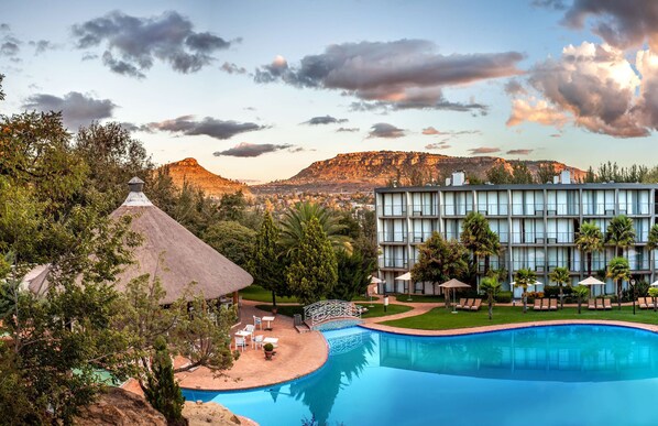 Outdoor pool, pool umbrellas, pool loungers