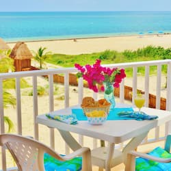 Suite Deluxe, 1 habitación, cocina, vistas parciales al mar | Balcón